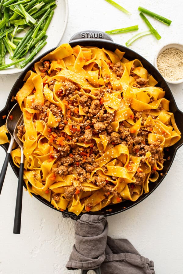 pork noodles in skillet.