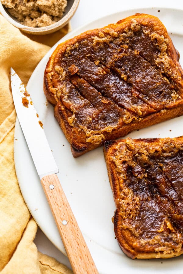 Pumpkin creme brulee french toast served with a knife.