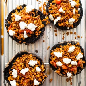 Stuffed portobello mushrooms with goat cheese on top.