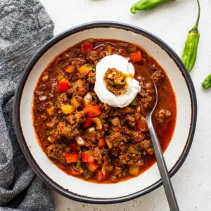 Texas Chili with with sour cream on the top.