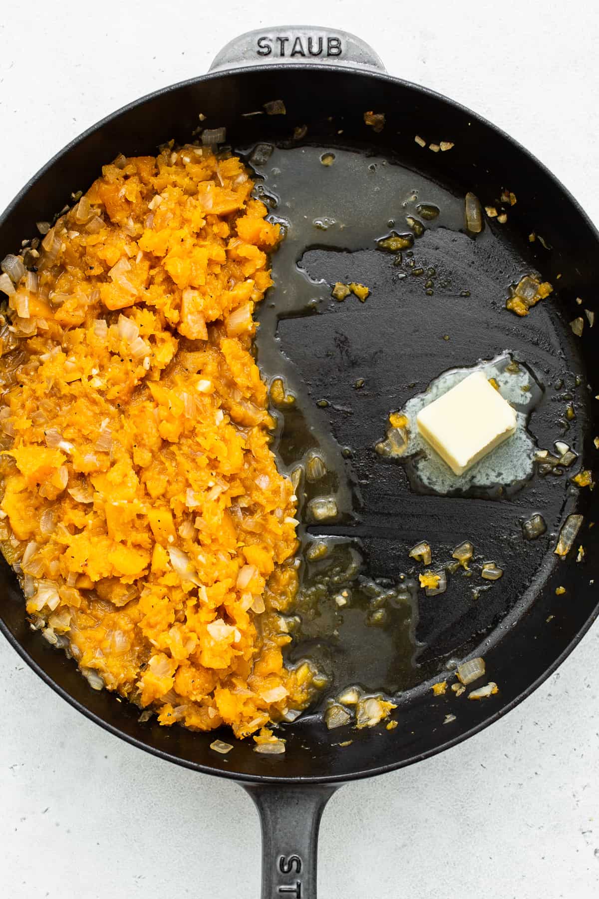 Melting butter in a skillet. 