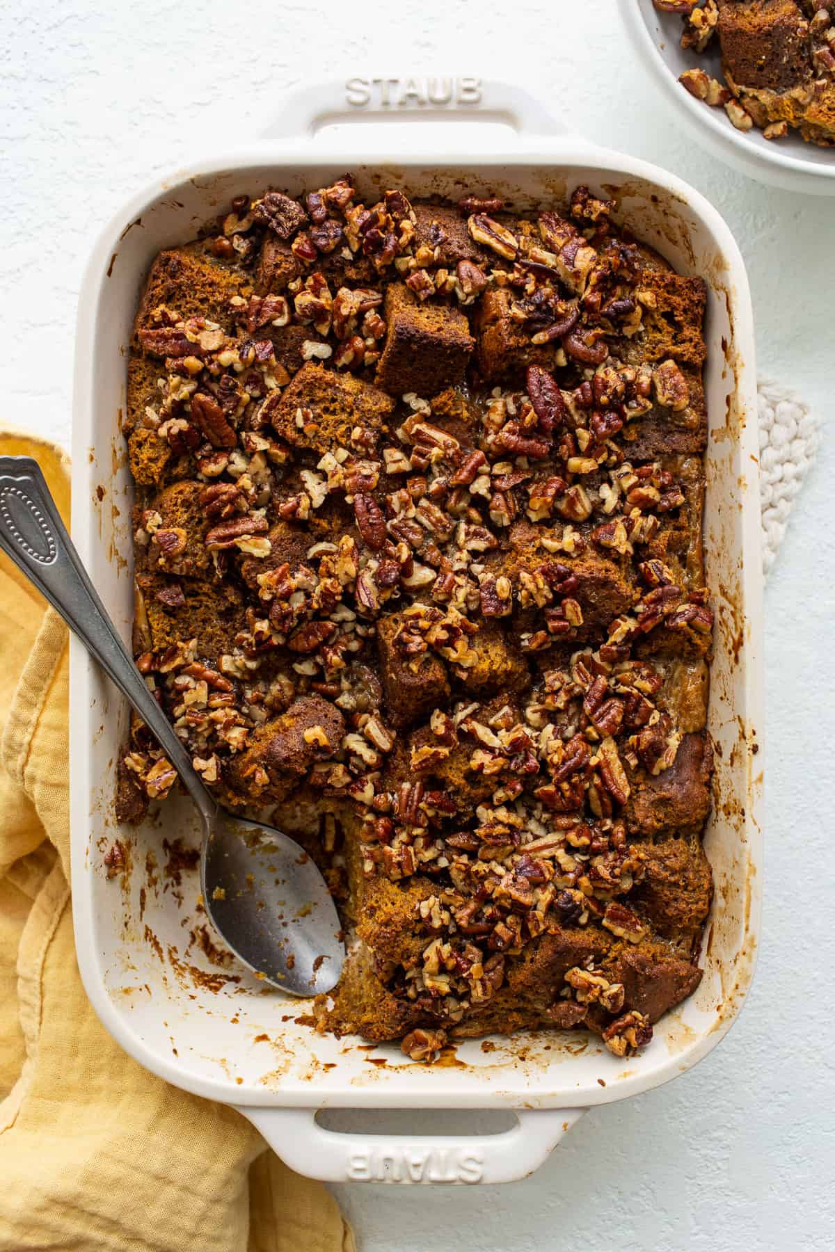 pumpkin bread pudding in casserole dish.