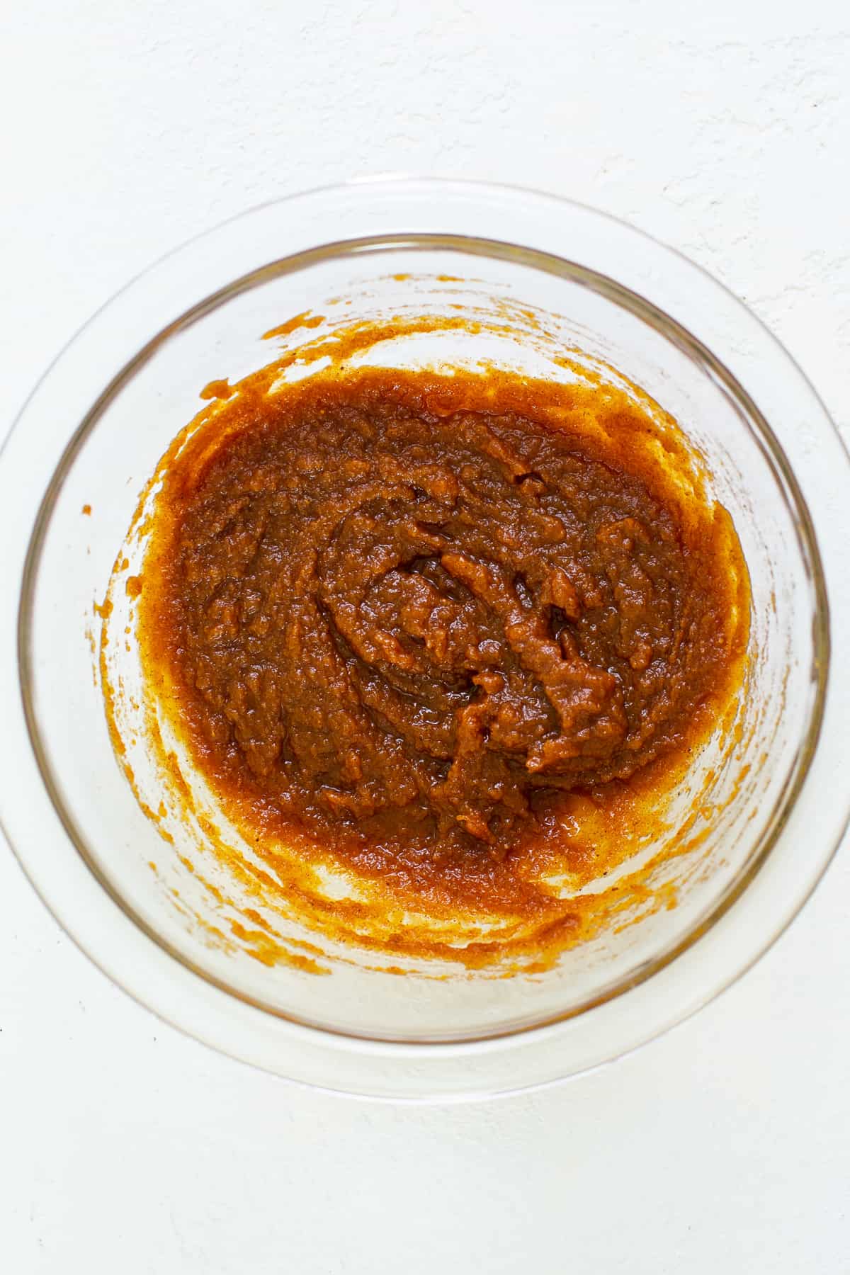 Pumpkin mixture for pumpkin mousse in a bowl.