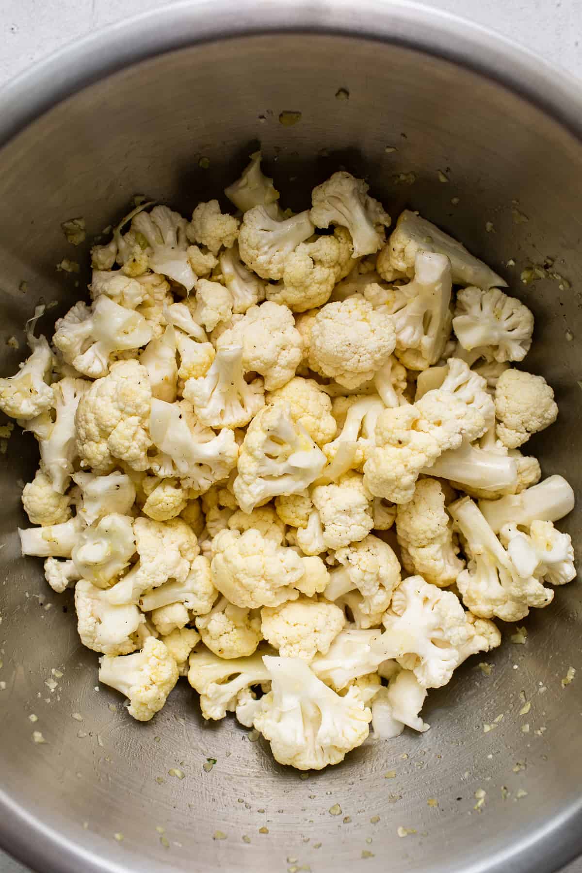 Cauliflower florets in a bowl.