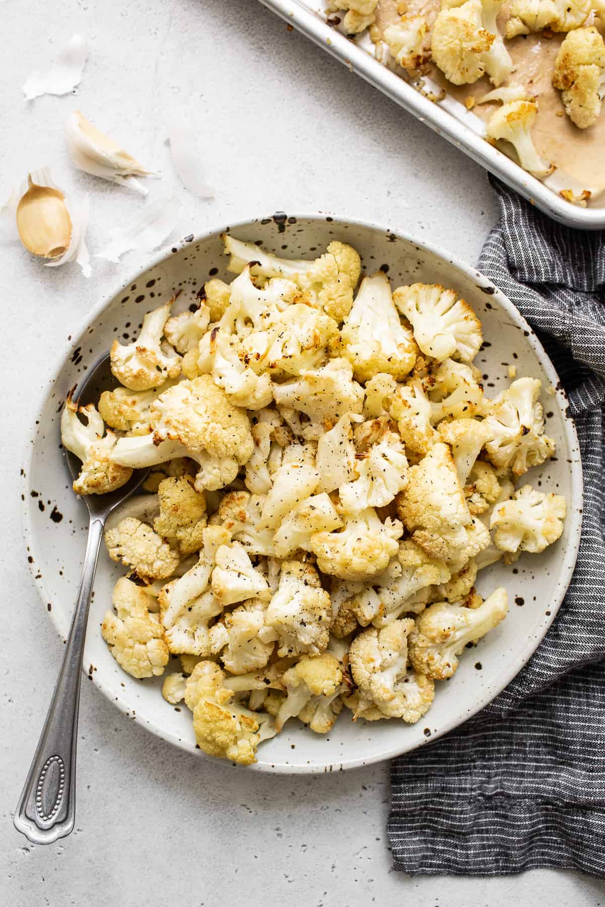 Garlic roasted cauliflower in a bowl.