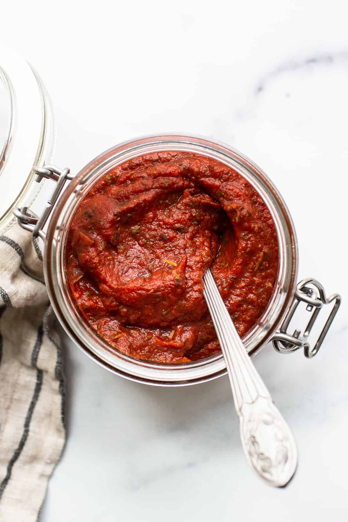 Homemade pizza sauce in a jar.