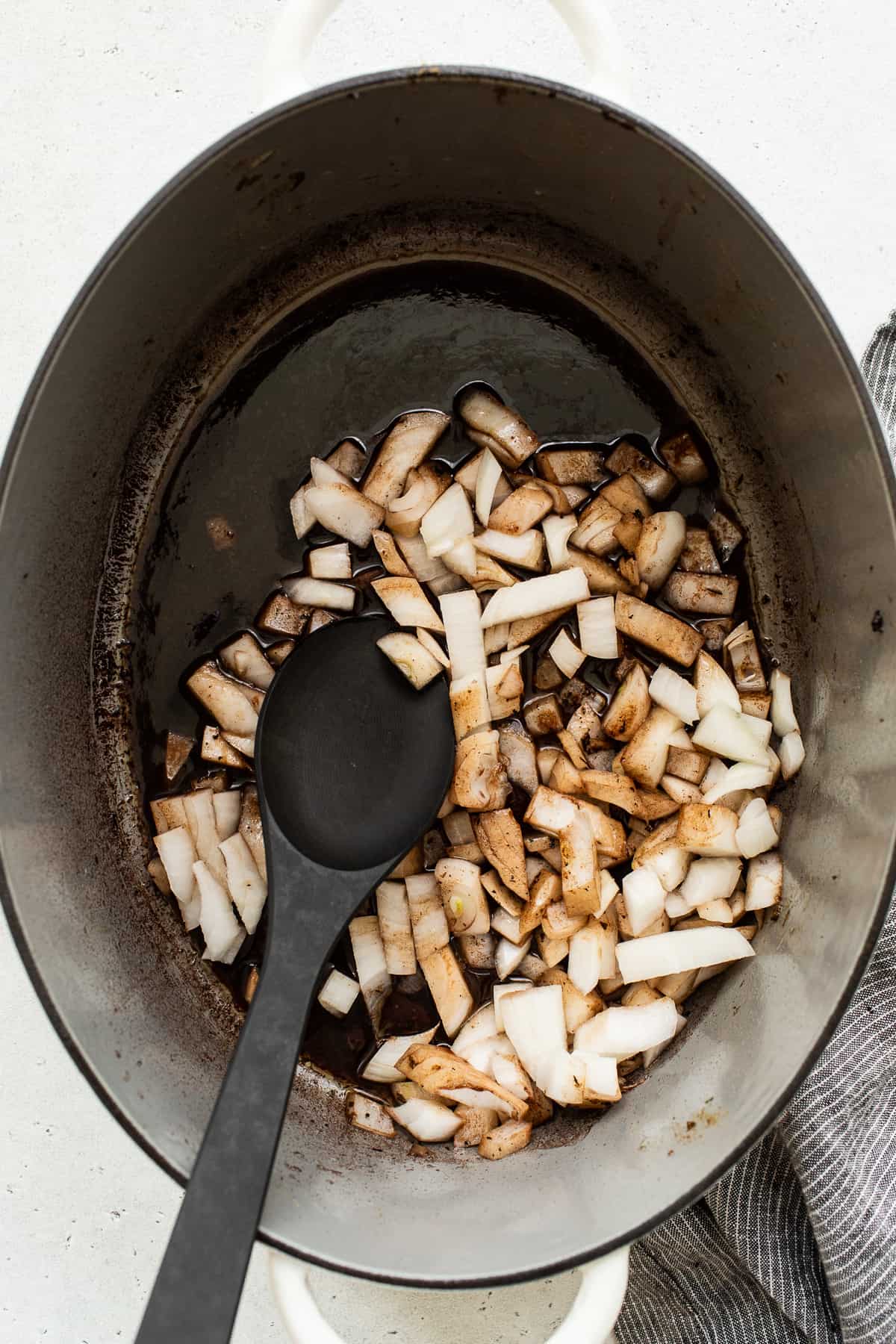 Diced onions in a dutch oven.