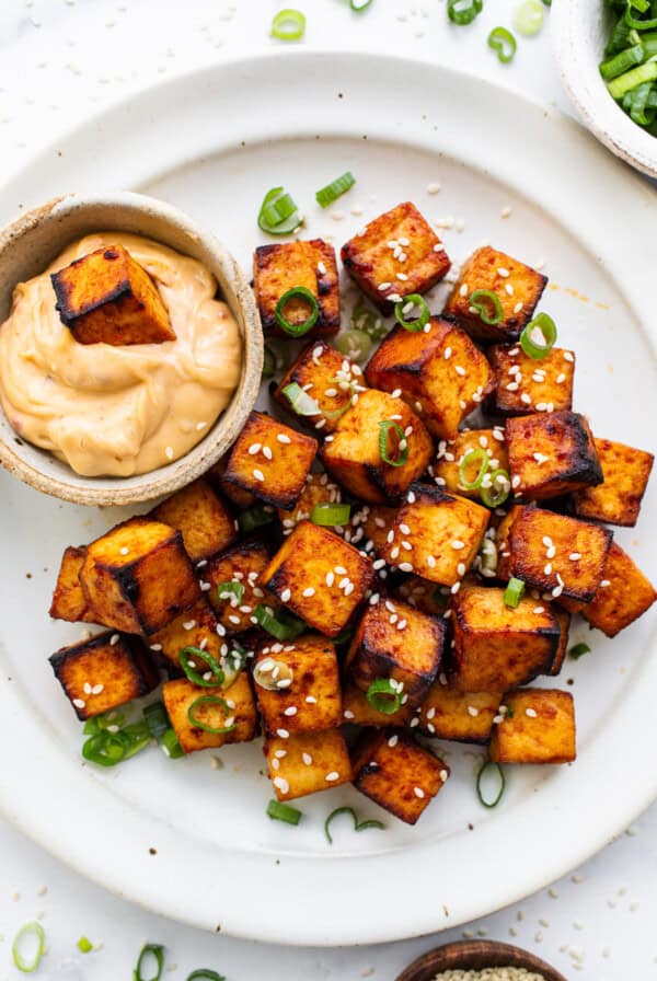 Air fryer tofu on a plate.