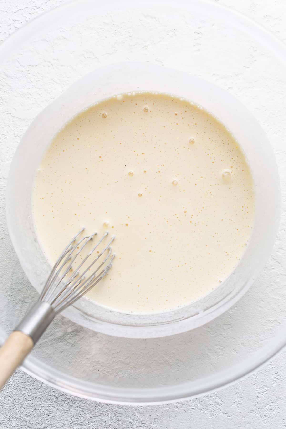 Melted ice cream in a bowl. 