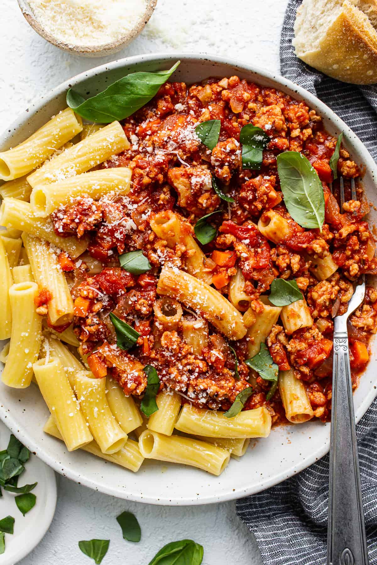 Ground chicken bolognese served over pasta.