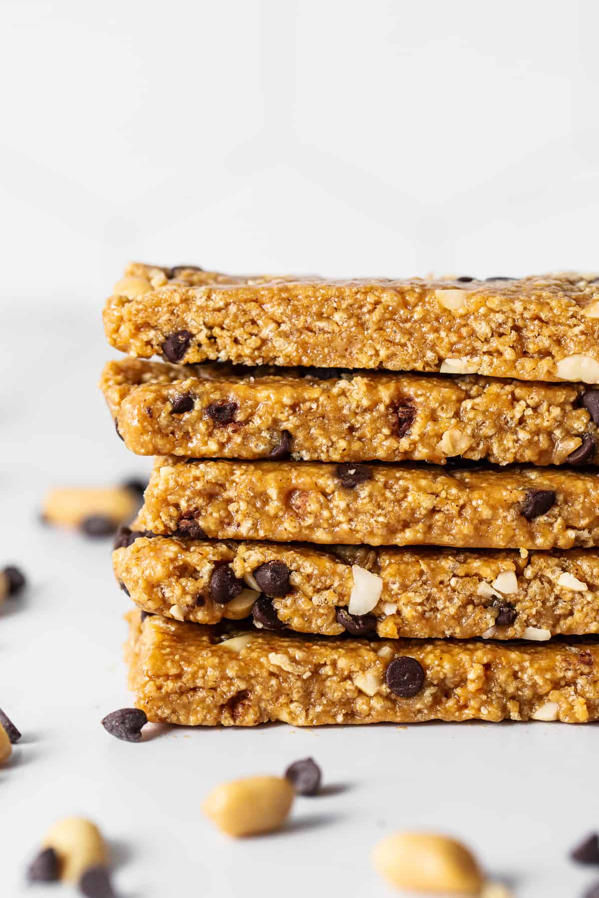 No bake peanut butter bars stacked on a plate.