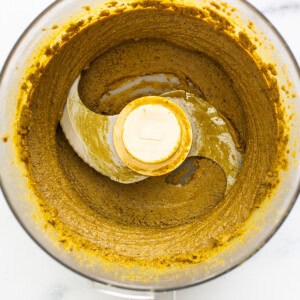 Creamy pistachio butter in a food processor.