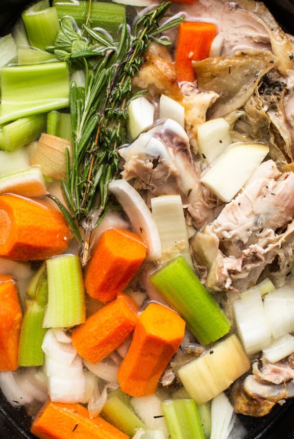 Homemade turkey broth in a crockpot.