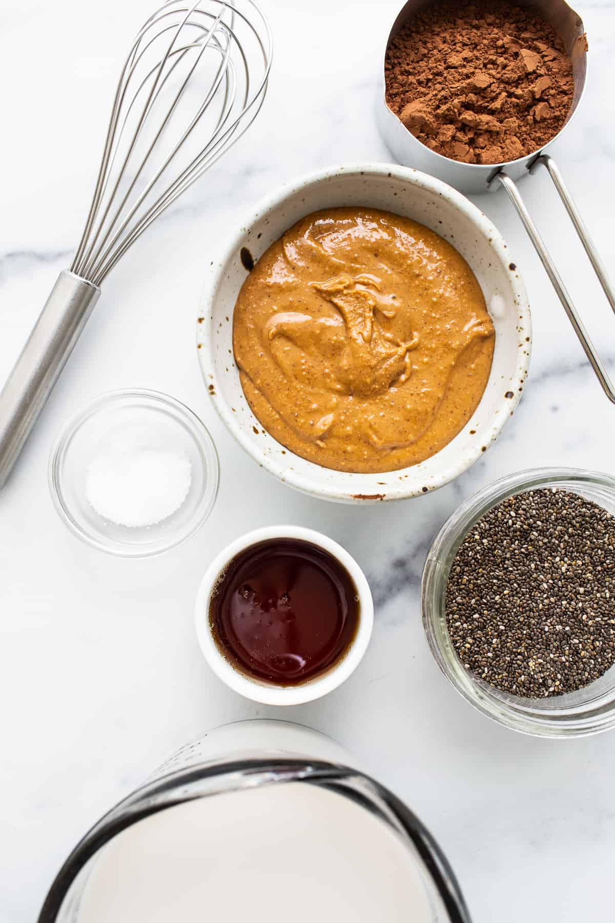 Ingredients for blended chia seed pudding in bowls.