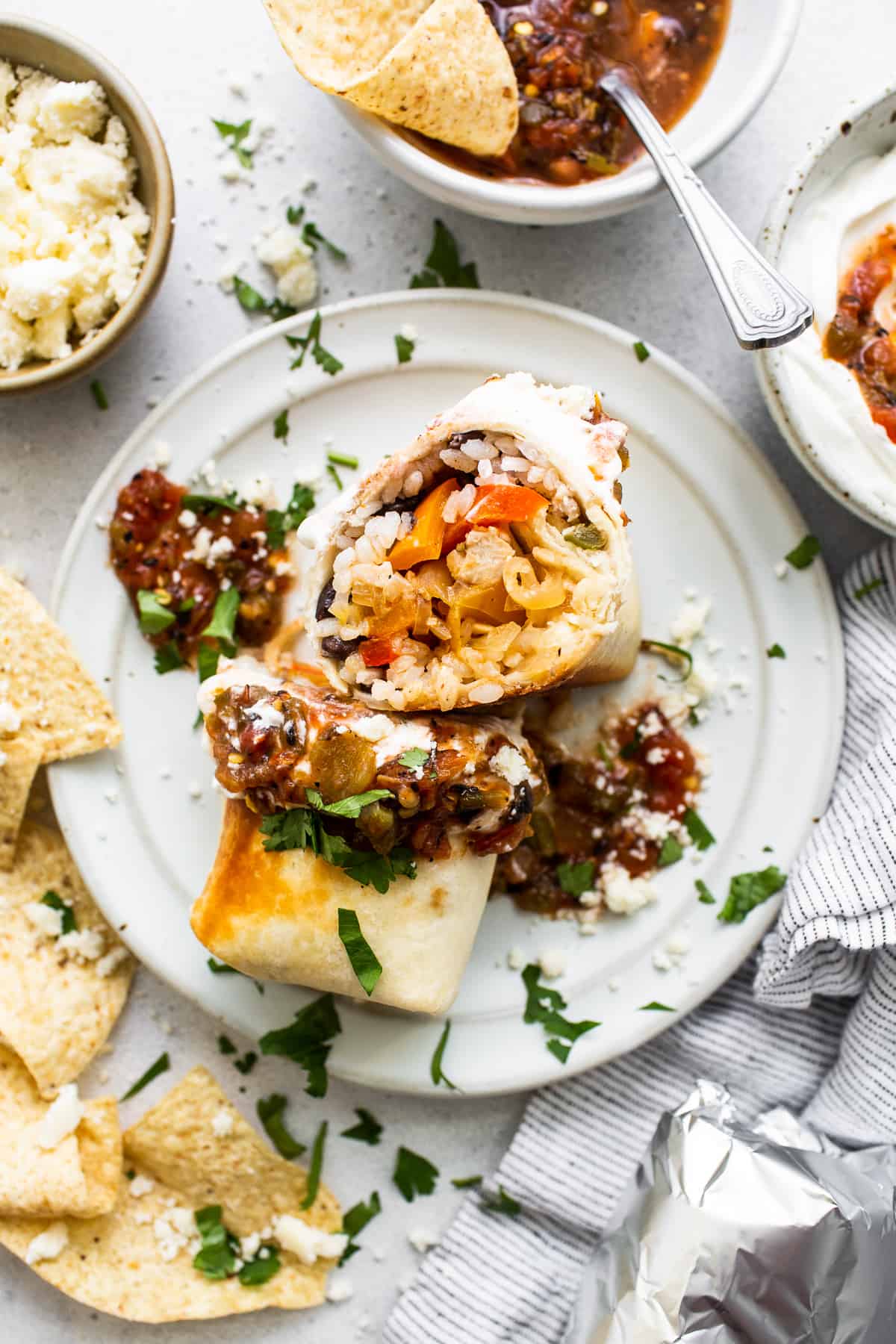 Chicken fajita burrito on a plate.