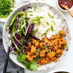 Ground chicken bowls with slaw and rice.