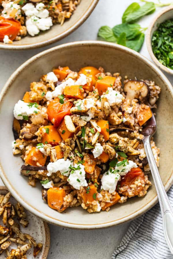 A bowl of roasted squash and feta risotto.