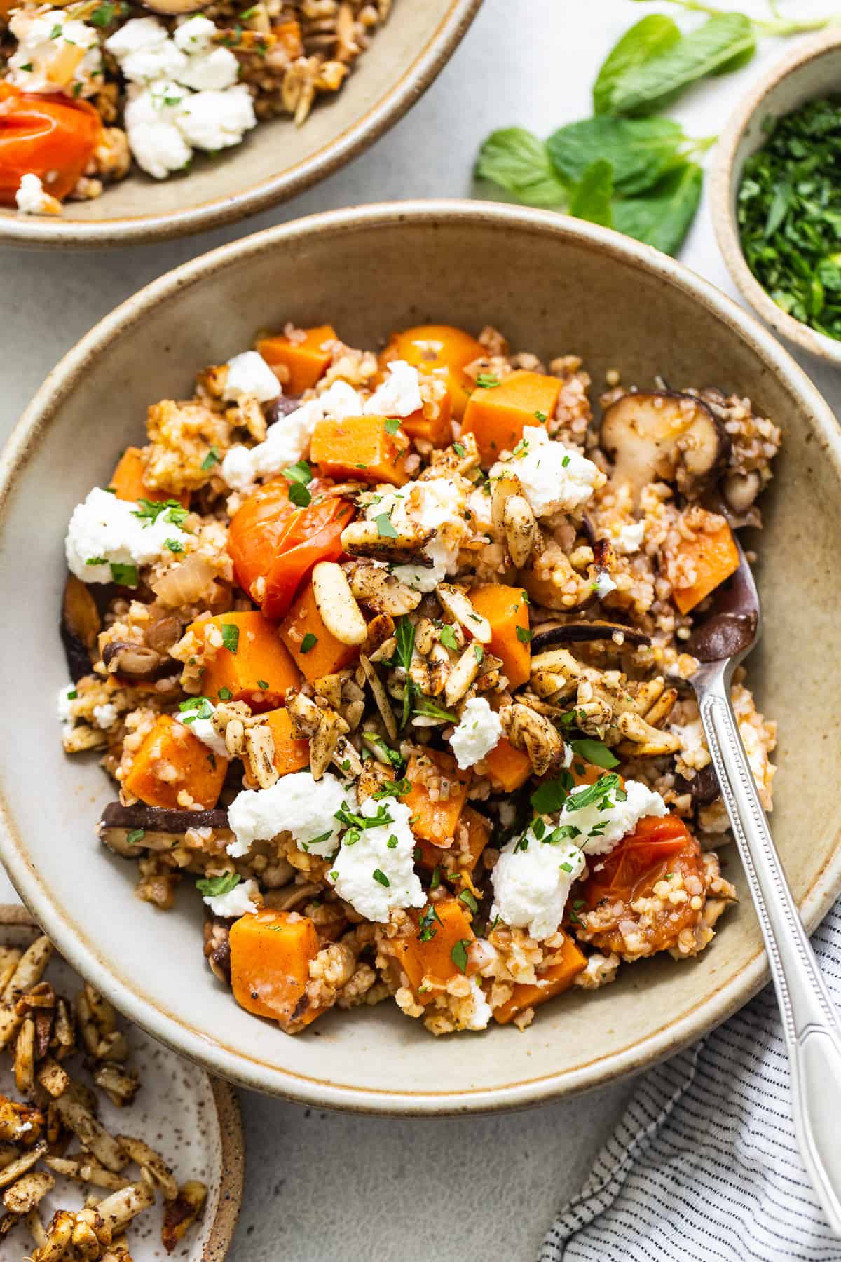 A bowl of roasted squash and feta risotto.