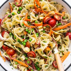 Bow tie pasta salad in a bowl.