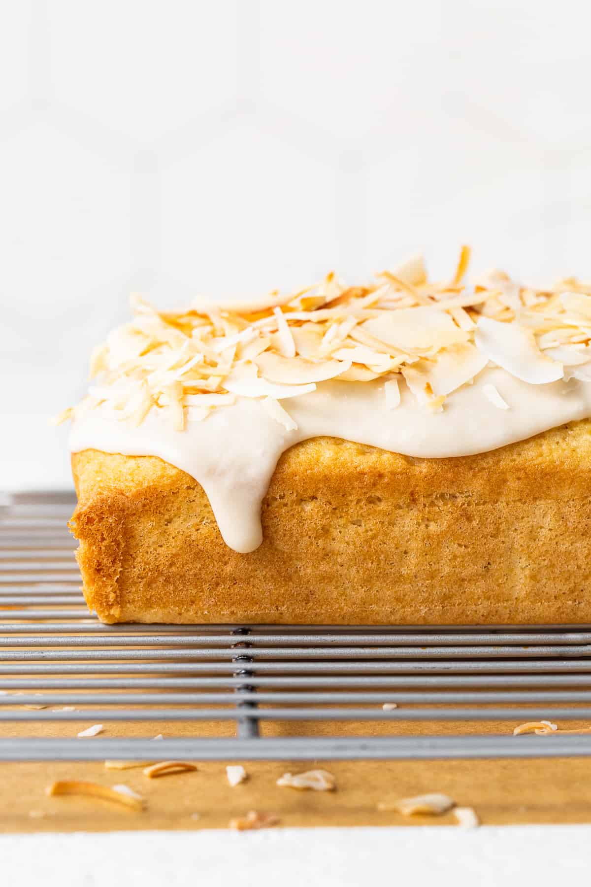 coconut cake on drying rack.