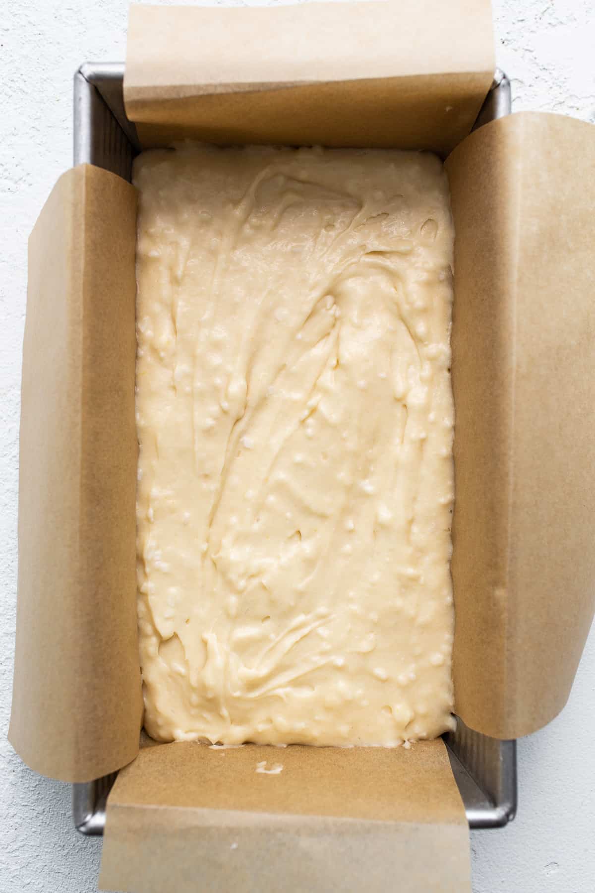 cake batter in loaf pan.