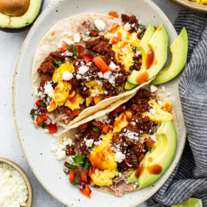 breakfast tacos on plate.