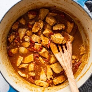 cooking chicken in balsamic in large pot.