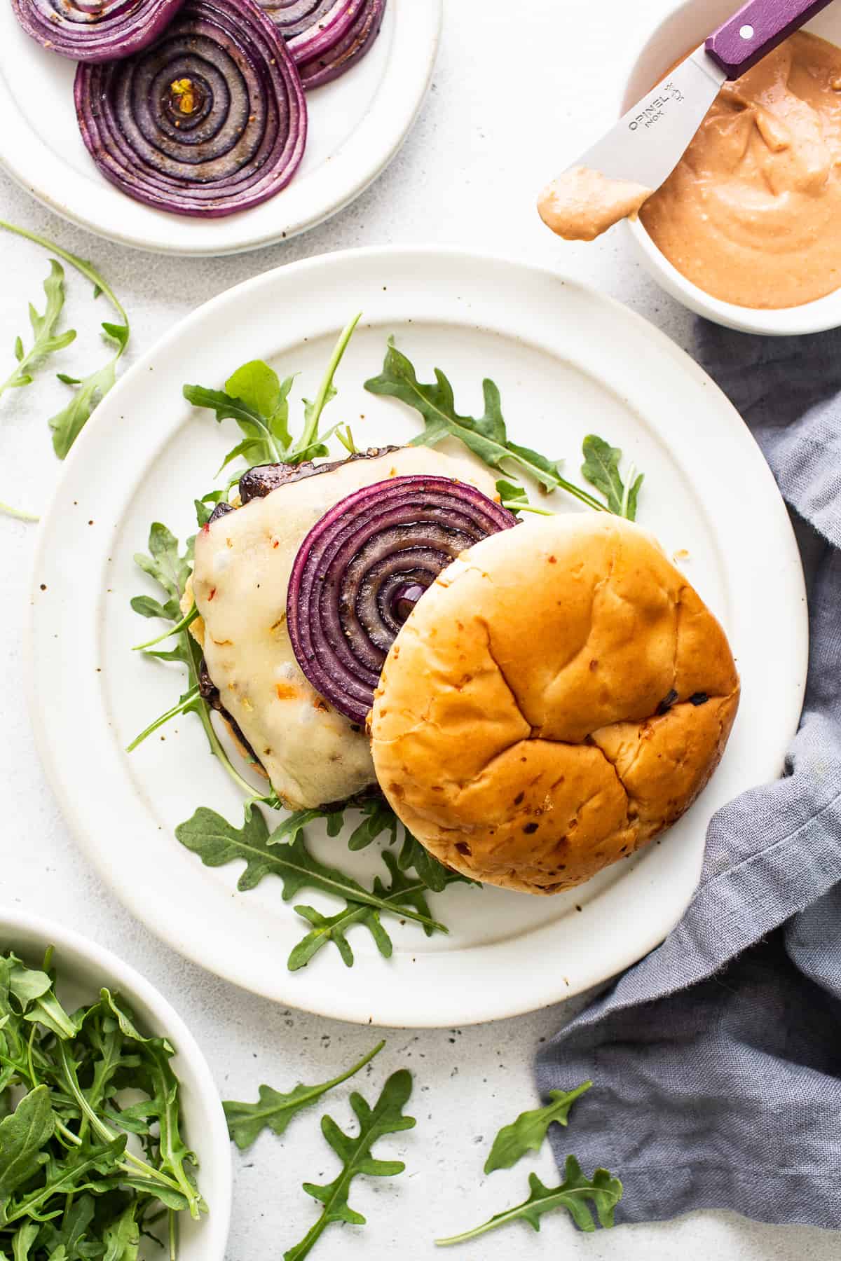 Portobello mushroom burger on a plate.