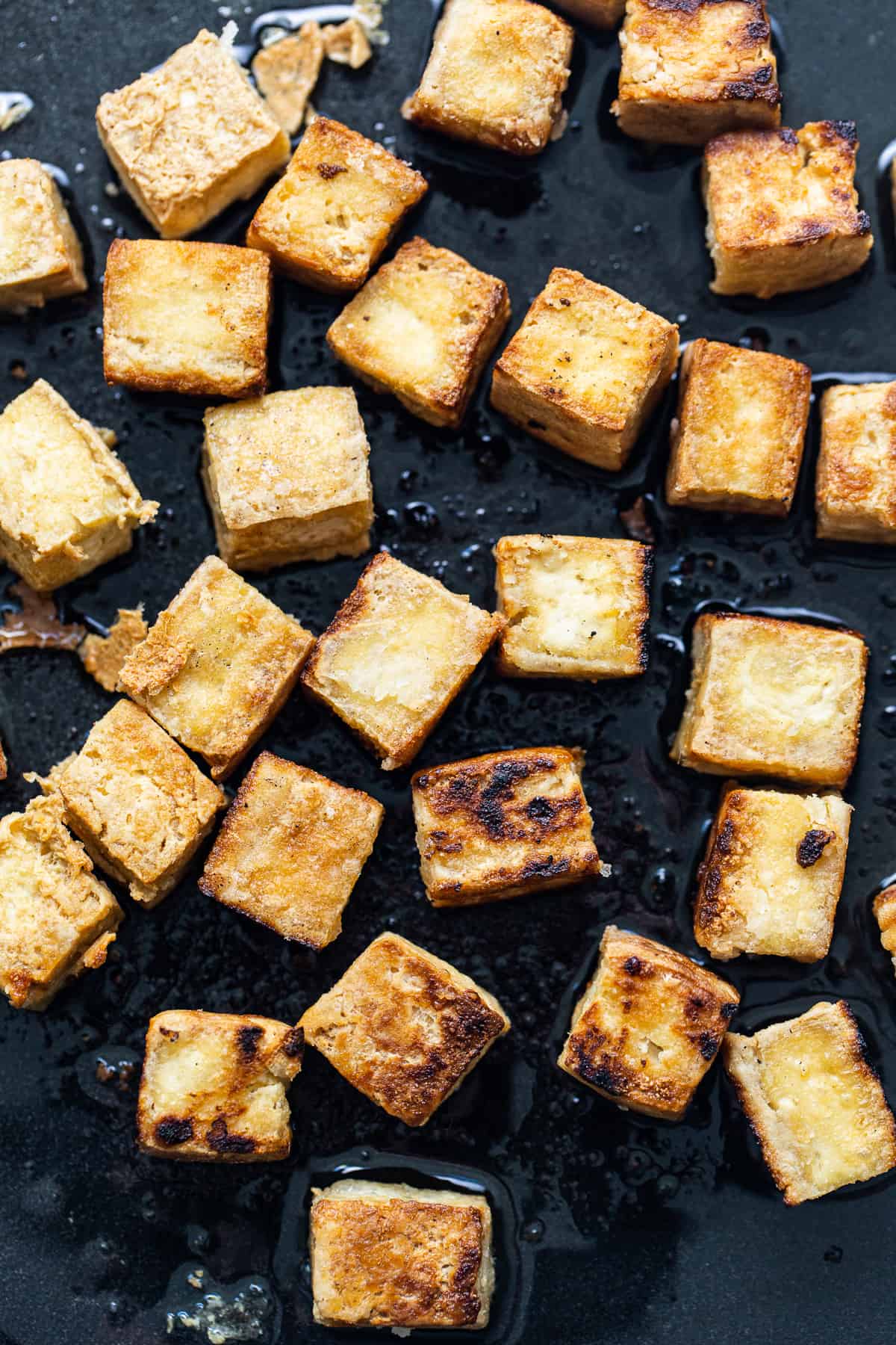 fried tofu on pan.