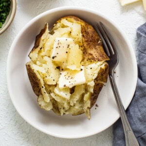 instant pot baked potato in bowl.