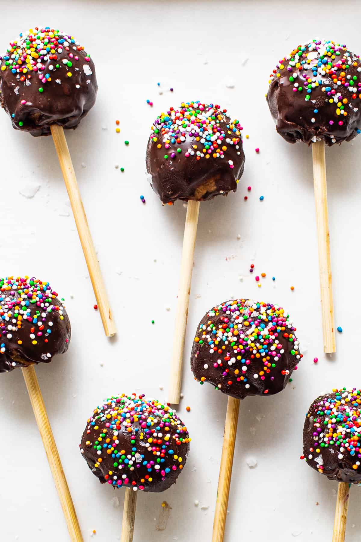 Protein cake pops covered in sprinkles.