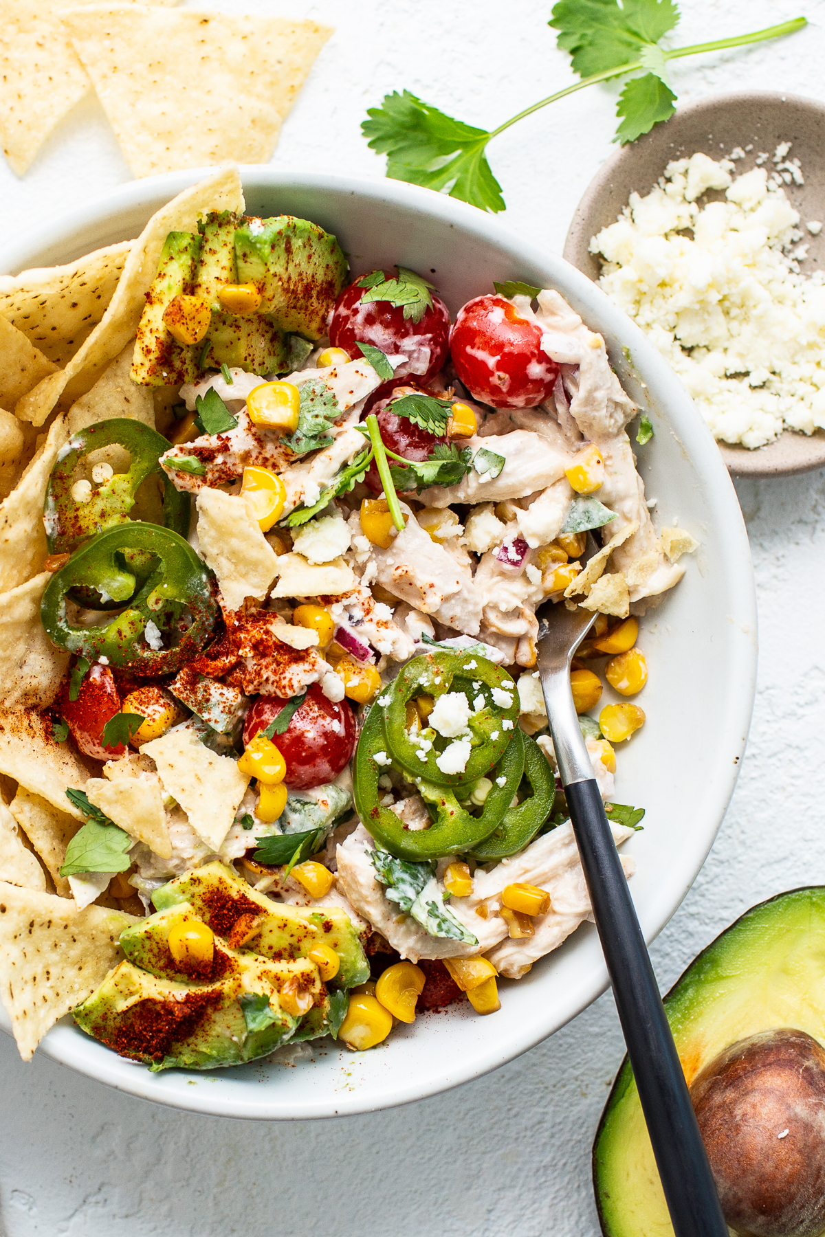 street corn chicken salad in bowl.