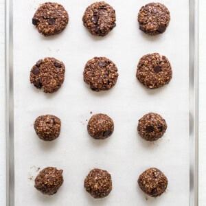 Chocolate oatmeal cookies on a baking sheet.