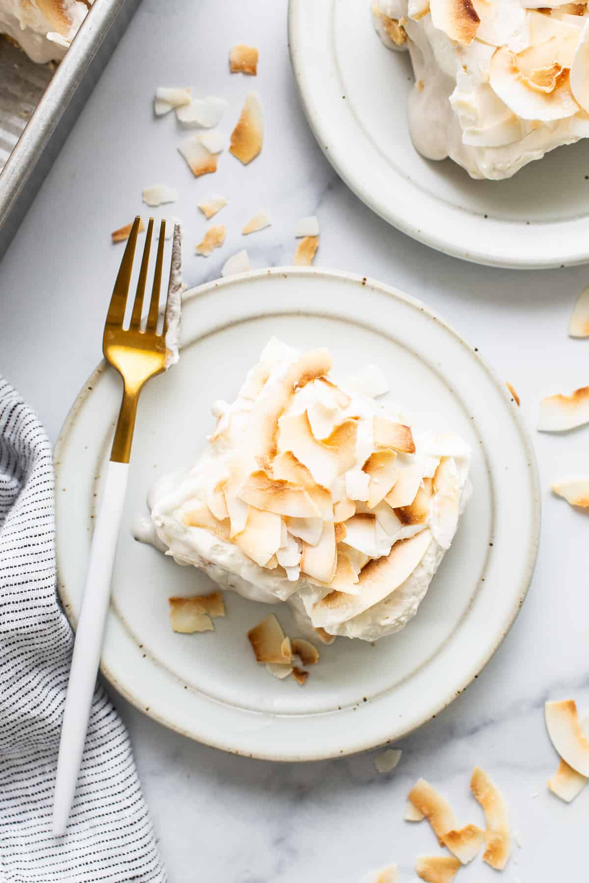 a piece of cake on a plate with a fork.