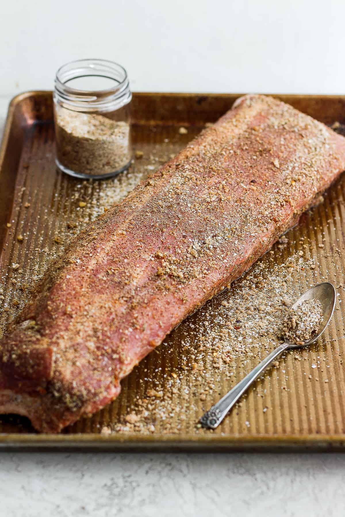 Dry rub on a rack of ribs.