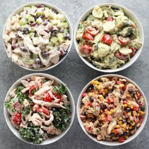 4 chicken salads in bowls.