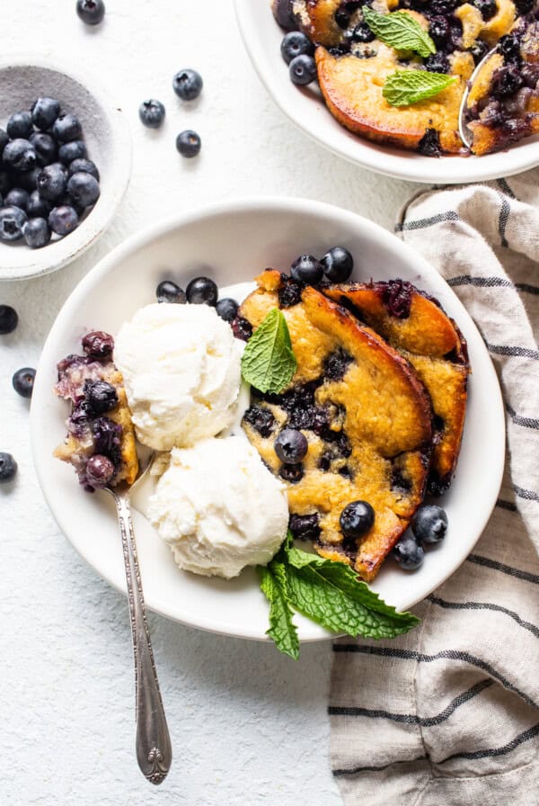 cobbler in bowl with ice cream.