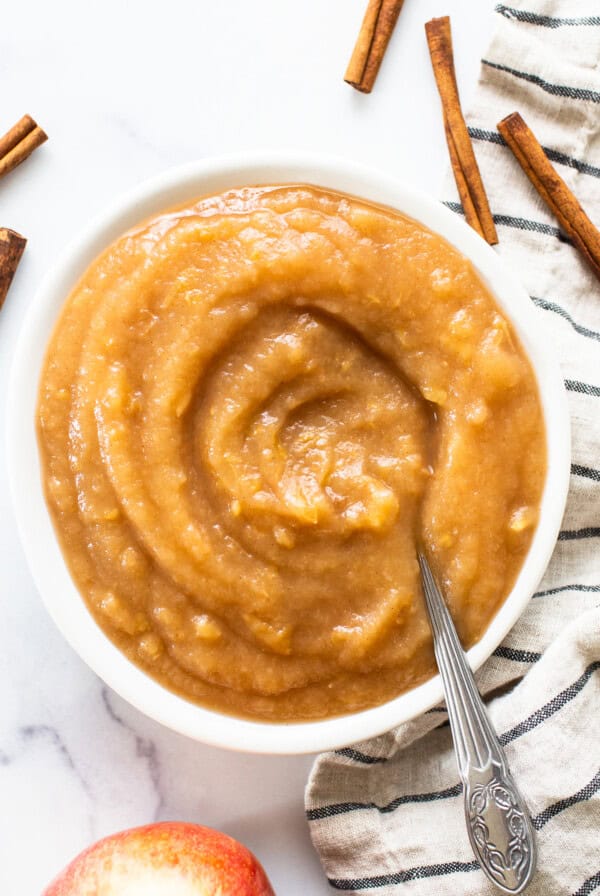 Apple butter made in an instant pot with cinnamon sticks.