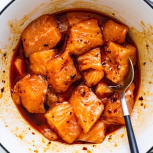 a bowl of food with a spoon in it.