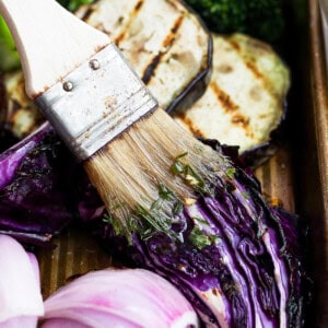 a close up of a brush with food in it.