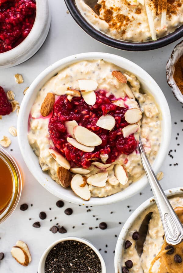 a bowl of oatmeal topped with fruit and nuts.