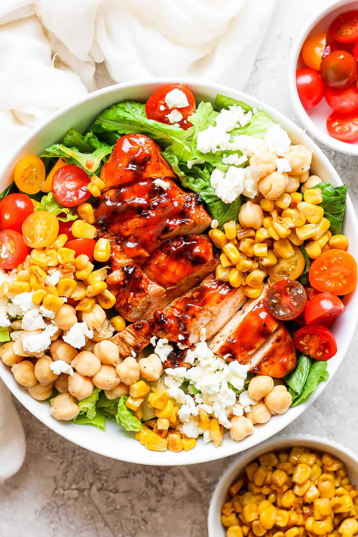 bbq chicken salad with corn and tomatoes.