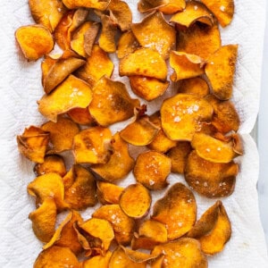 Sweet potato chips on a baking sheet.