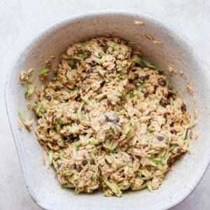 A bowl full of oats in a white bowl.