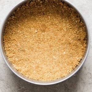 A pie crust in a bowl on a table.