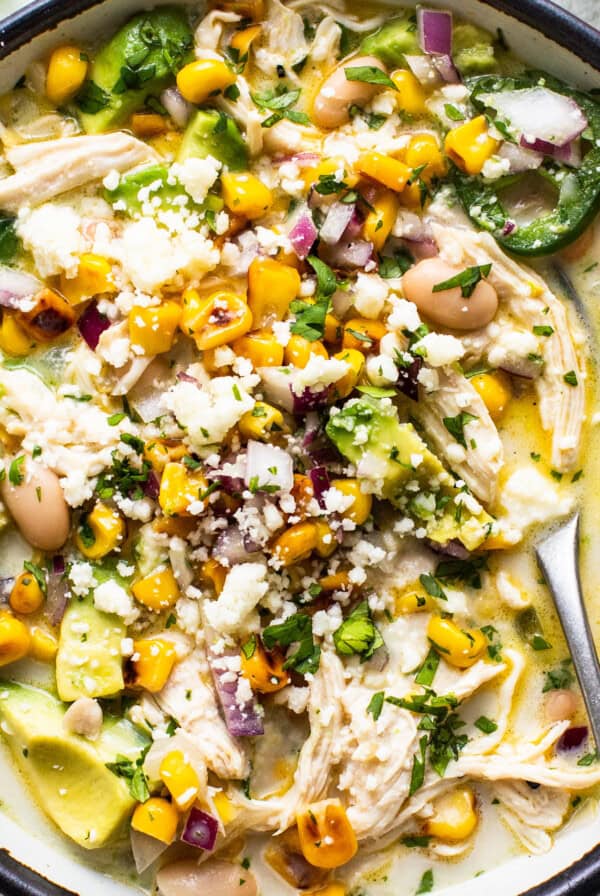 Chicken and corn soup in a bowl.