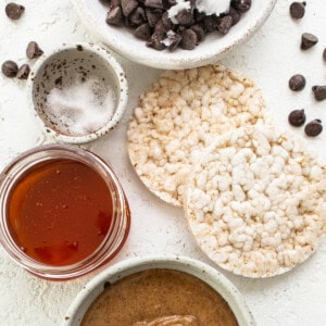 A bowl of peanut butter, chocolate chips, and other ingredients.