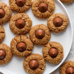 Easter egg cookies on a white plate.