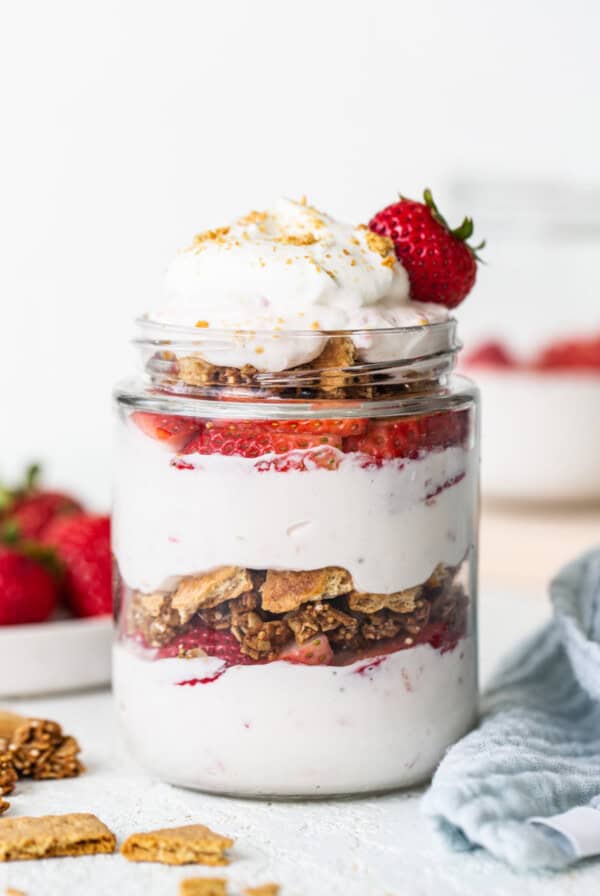 Strawberry granola parfait in a jar.