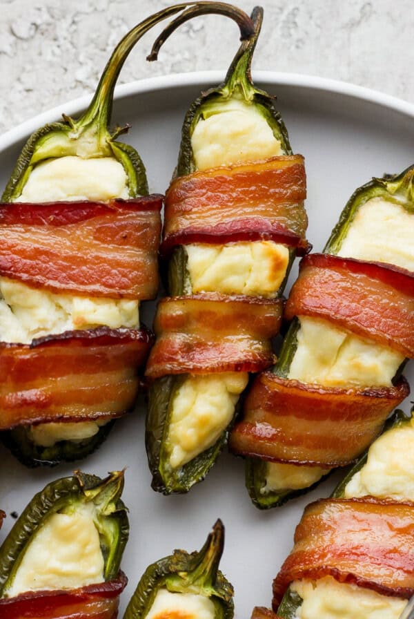 Jalapeno poppers served on a plate.